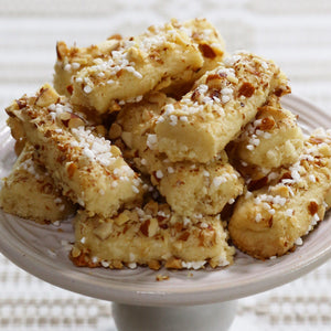 finnish sticks shortbread cookies on a cake stand